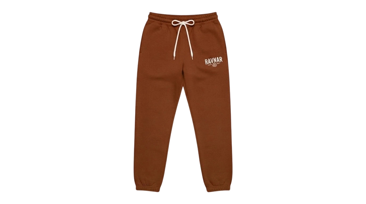 Ravnar brown heavyweight sweatpants with a drawstring waist and white logo embroidery on the left hip.