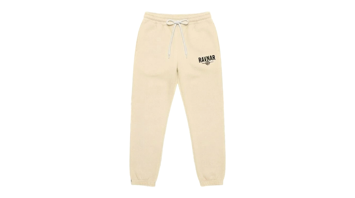 Ravnar cream heavyweight sweatpants with a drawstring waist and black logo detail on the hip.