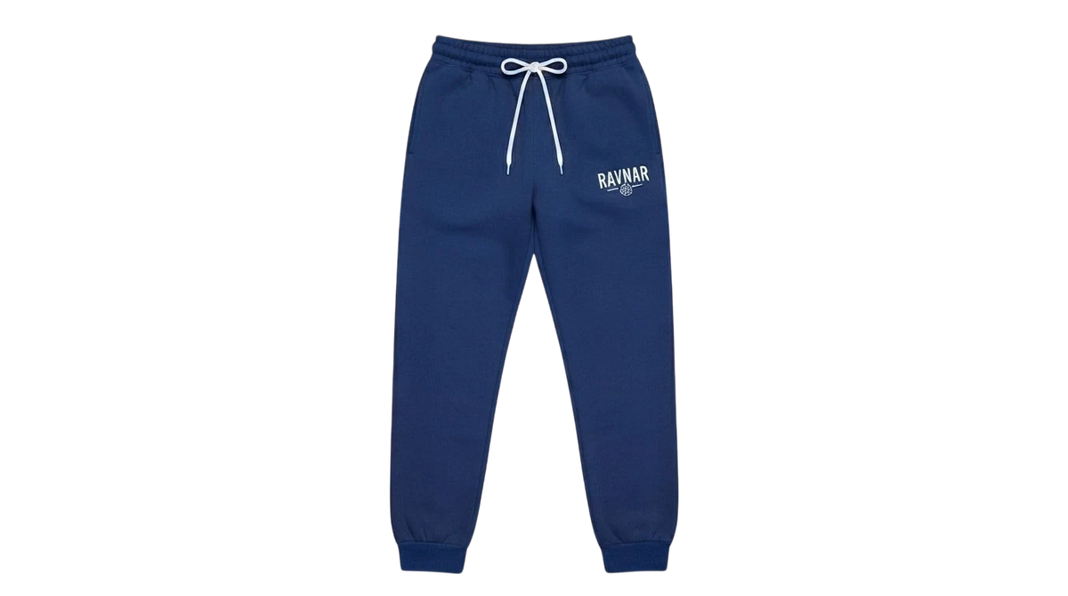 Ravnar navy blue heavyweight sweatpants with white drawstring and logo detail on a grey background