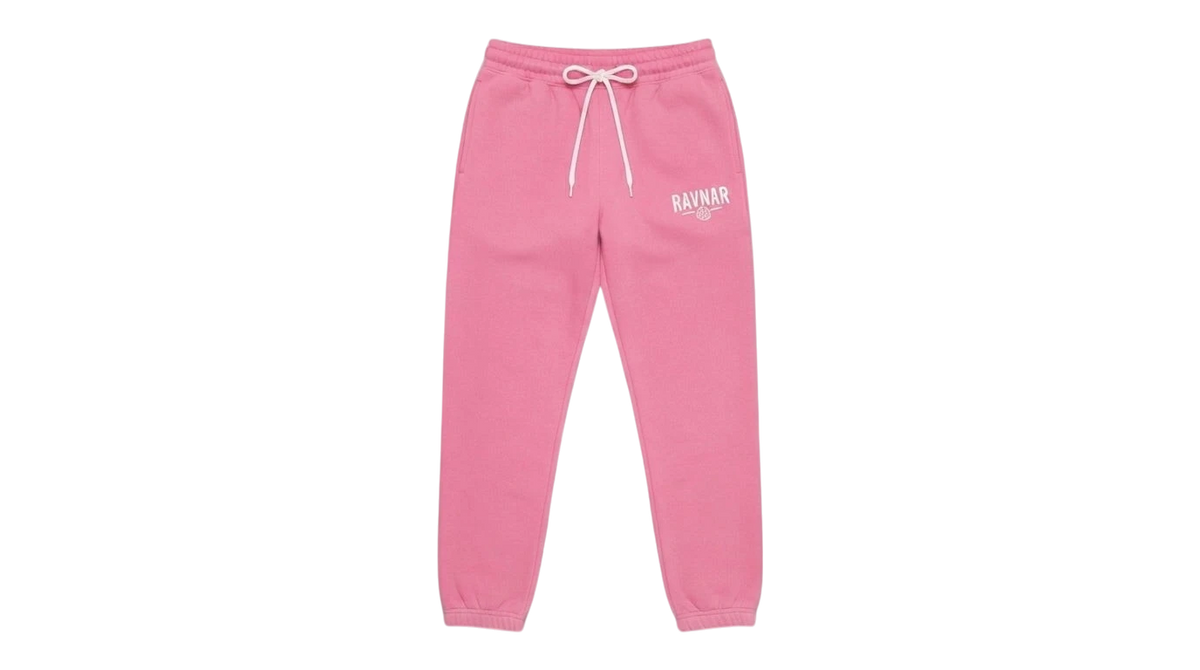 Ravnar pink heavyweight sweatpants with a white drawstring and logo on a grey background.