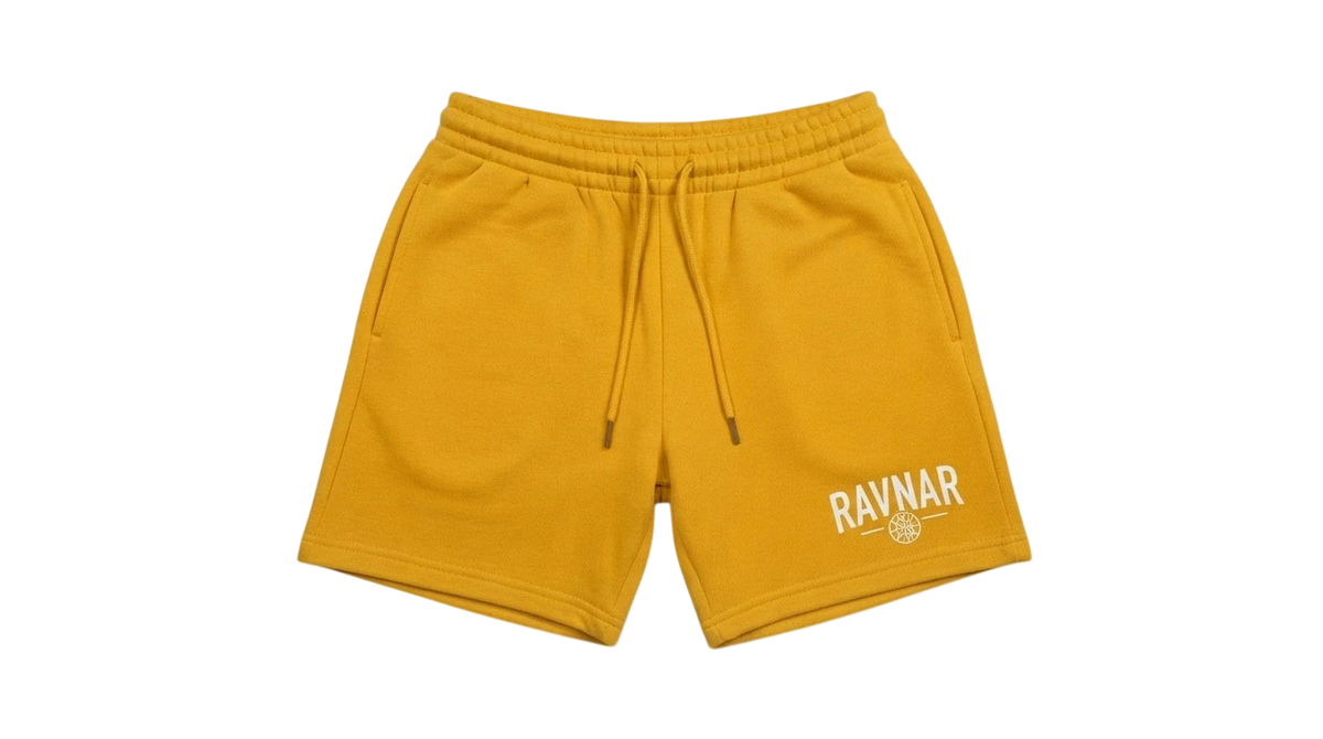 Ravnar yellow heavyweight cotton shorts with a relaxed fit, drawstring waist, and white logo detail.